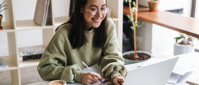 Woman e-filing her taxes on a laptop